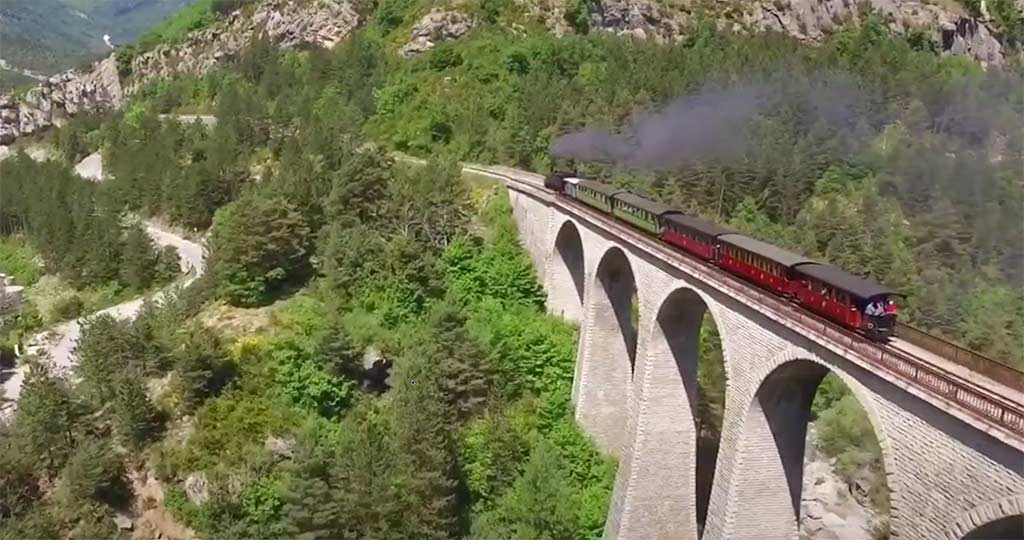 A Steam Train on a huge bridge - Train des Pignes